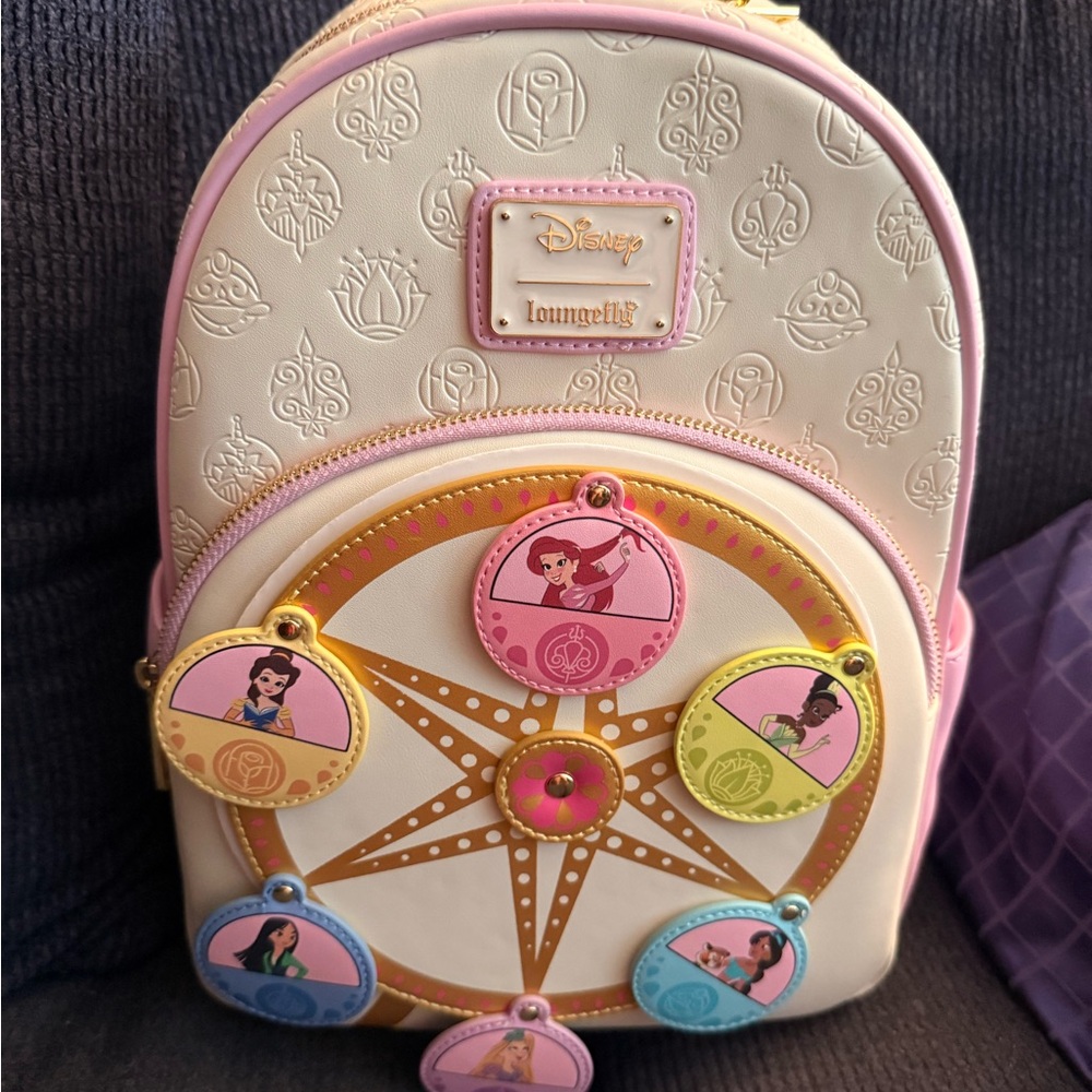 SOLD LF Cream and Pink Backpack with Character Discs